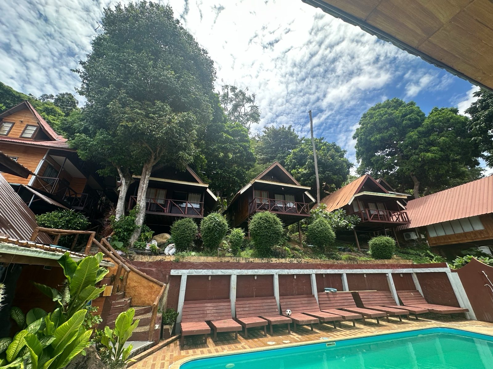 A row of Phi Phi cottages after processing, sky and greens recovered.